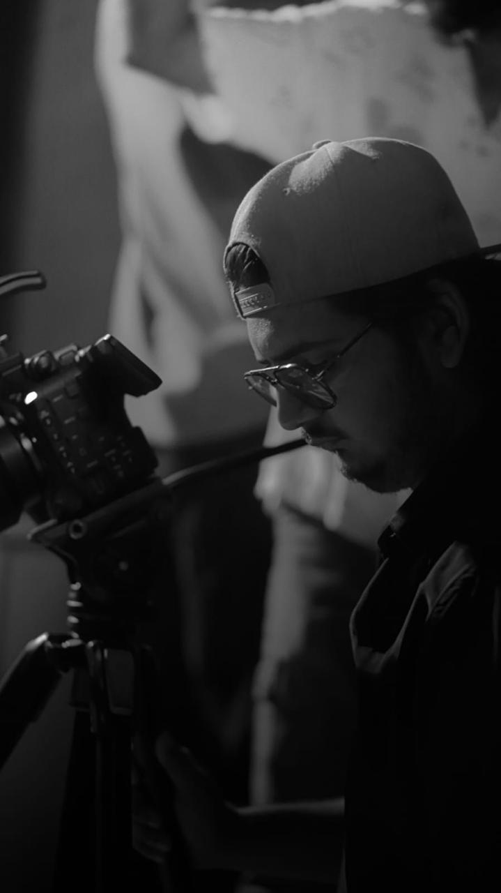 Student operating a professional cinema camera at Ayjos Nova